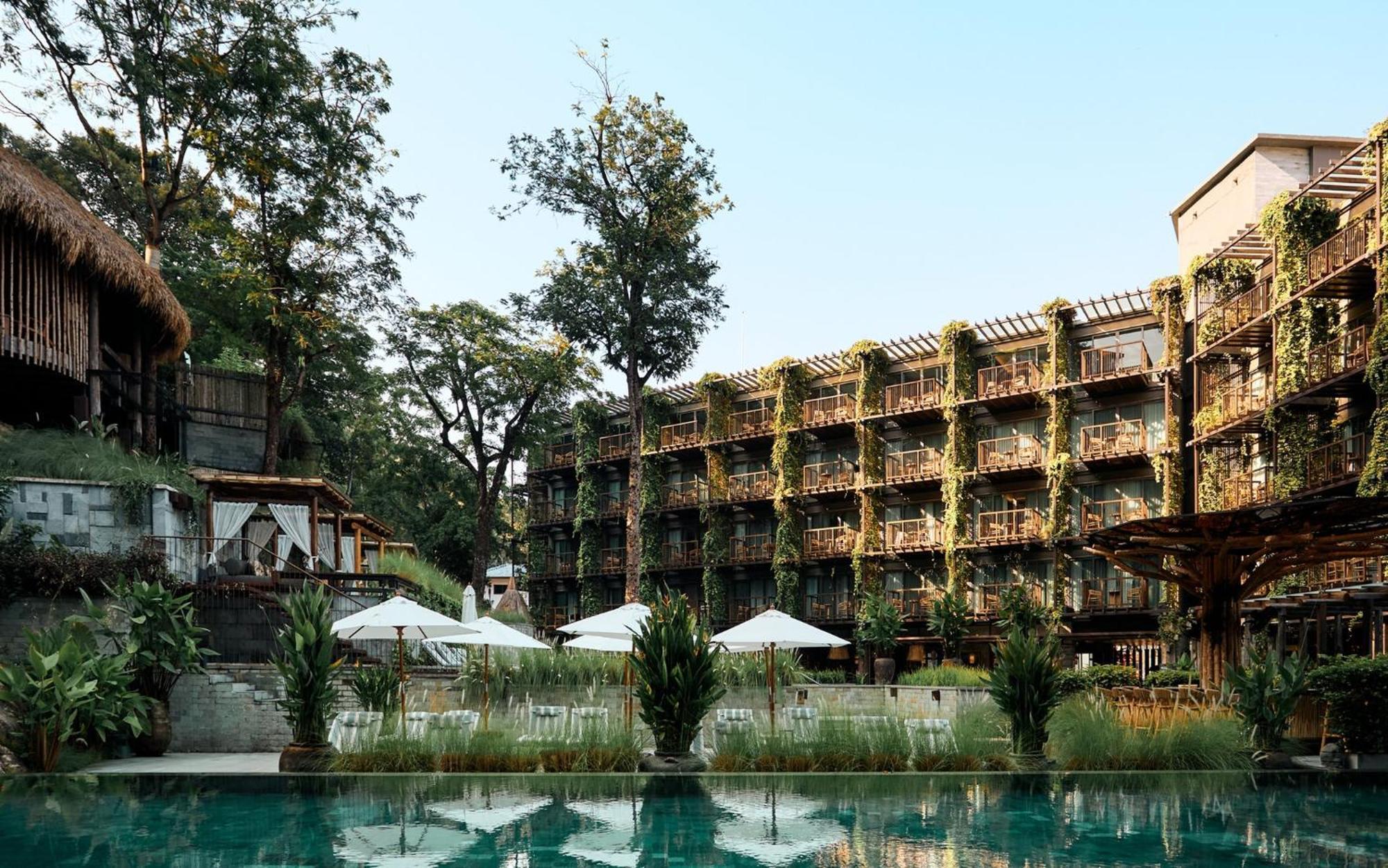 Dinso Resort & Villas Phuket, Vignette Collection By Ihg Patong Экстерьер фото The hotel's main pool